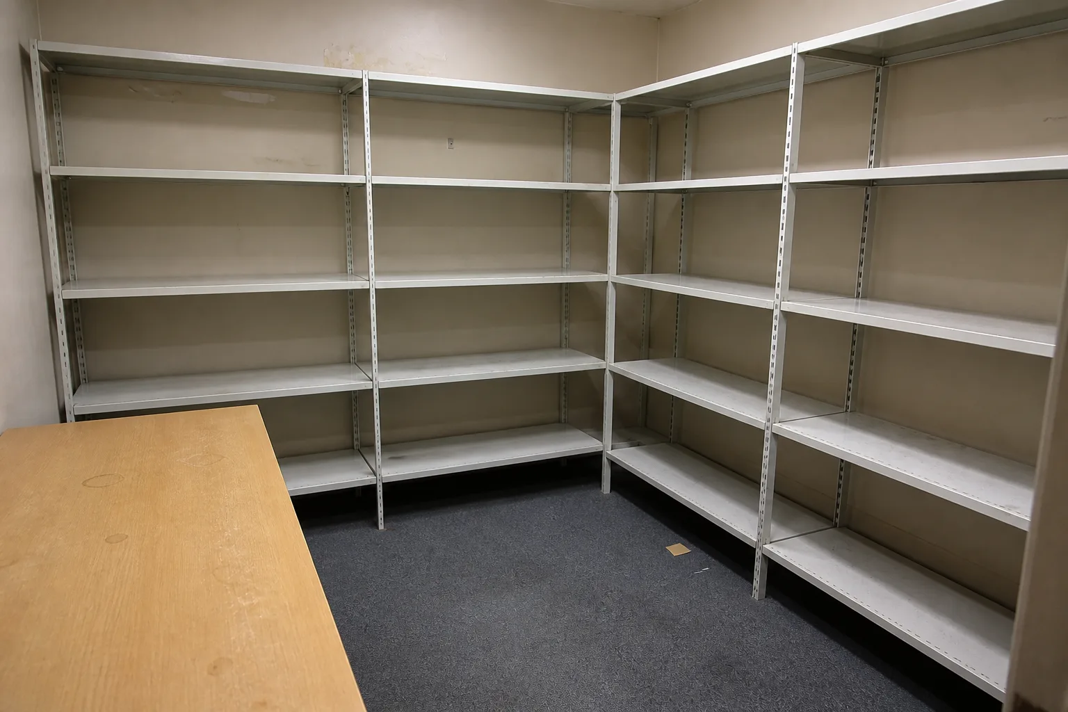 Illustrative archive room before and after confidential document collection — after